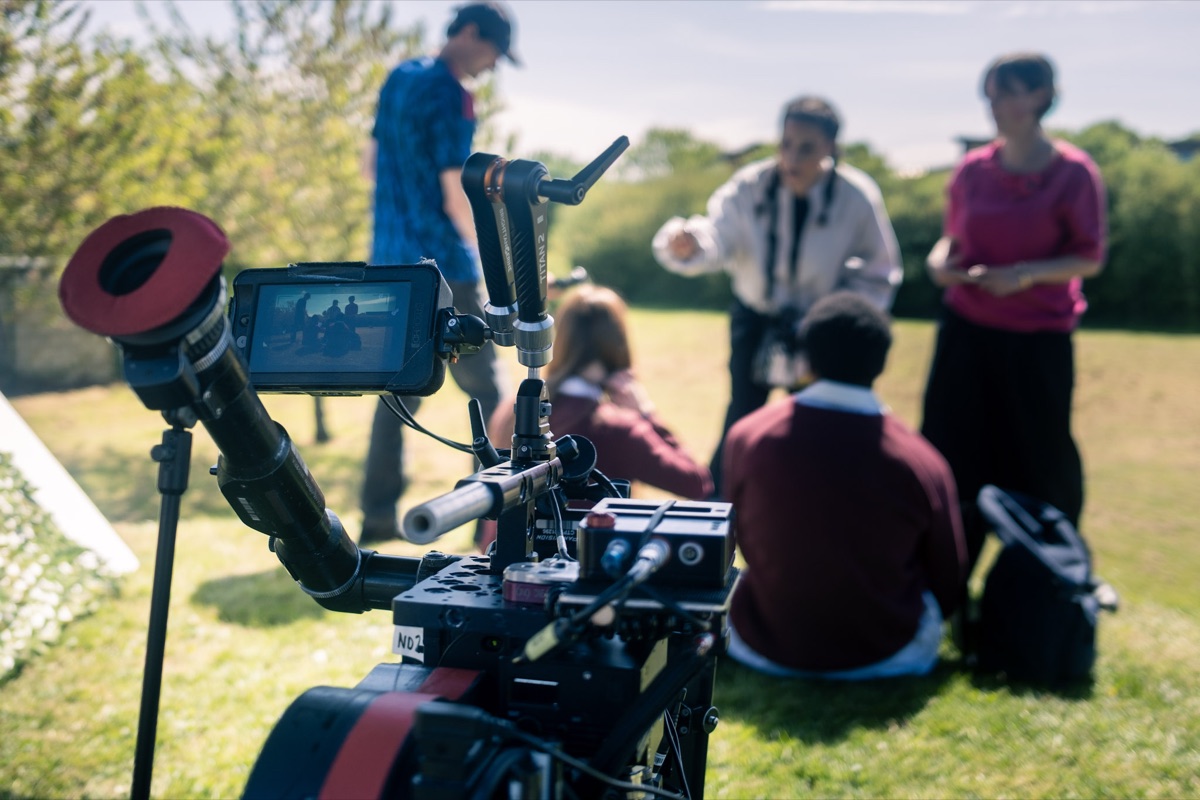 The camera, on the school field.